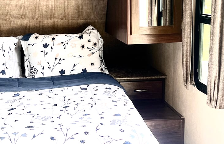 Small shelve for phone plus USB plugs. Side Cabinet for personal storage.