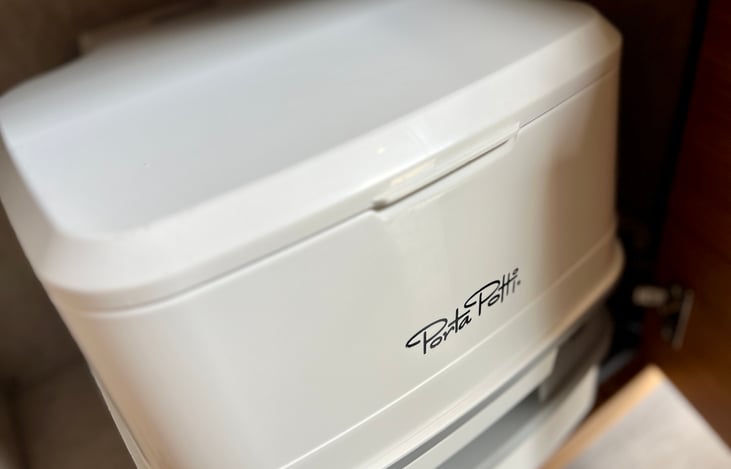 Porta-Potti cassette toilet. No needed to visit dump station.