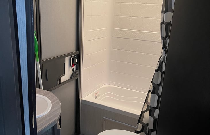 Full size bath with the shower head