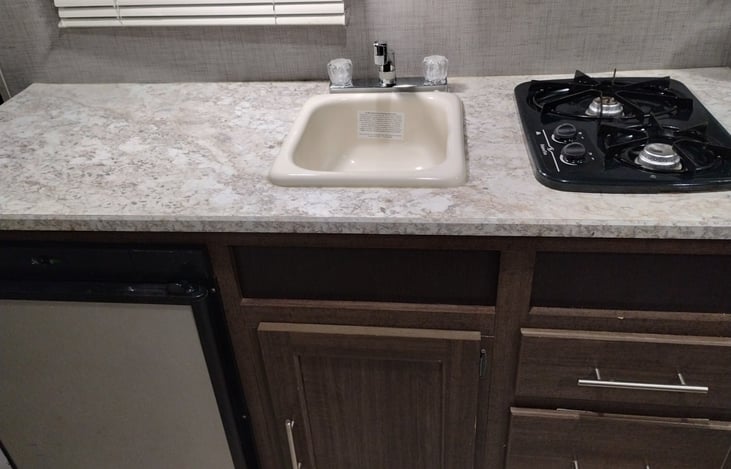 Kitchen sink and two burner stove