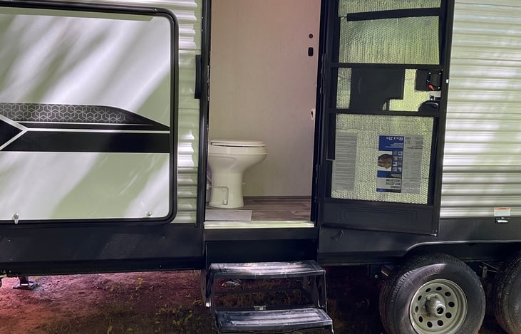 2nd entry door goes to the bathroom.