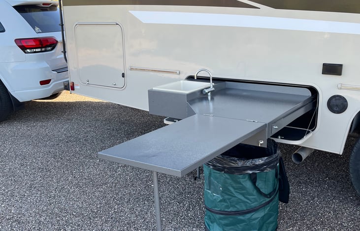 Outdoor kitchen area with sink. Balckstone grill (not shown)