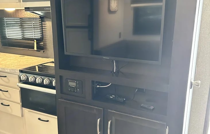 Television and radio with outside speakers for lots of fun.