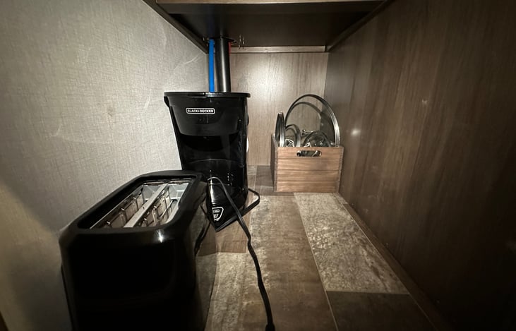 Under the sink storage.  Coffee maker and toaster available.  (Actual image)