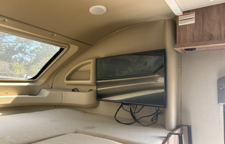 over the cab bed with tv