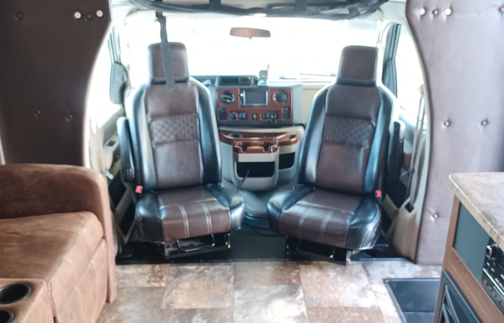 Driver and passenger seats that swivel for more seating. Swivel to add more seating in RV for quests