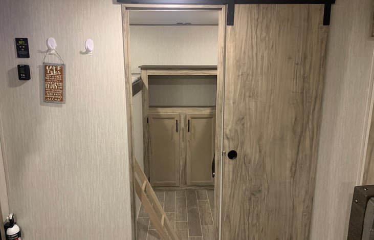 Bunkhouse for the kids. Has sliding barn door for privacy