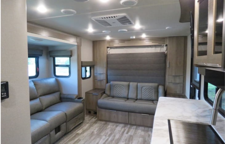 Couch folds down for Murphy Bed.