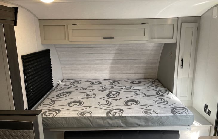 The murphy bed can be folded up during the day and the couch pops up.