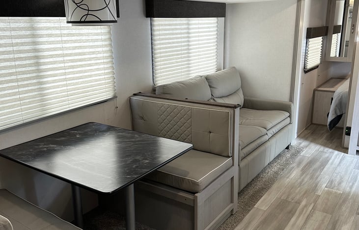 Dining and Couch that turns into bed