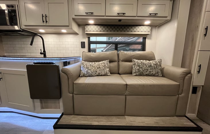 Sofa seats 3 and also folds out to a sleeper.