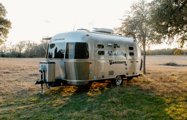 It's a beautiful boutique hotel room that grew legs and wandered over to your desired spot in the Hill Country all wrapped up in an iconic Airstream trailer.