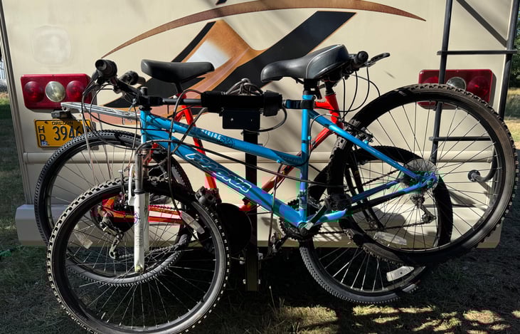 Two of the bicycles available for guest use are mounted on the bike rack that can hold up to 4 bikes.