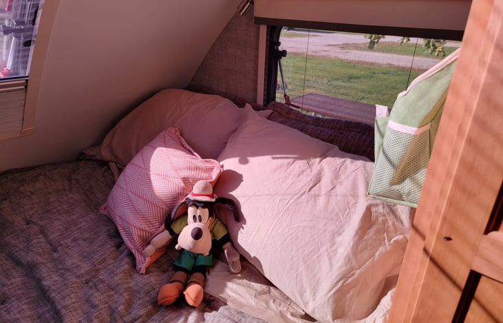 Queen bed with side window