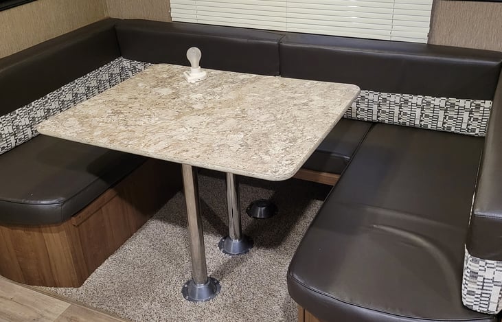 Dinner area where you can sit 6 people or turn the table long way and sit 4 people