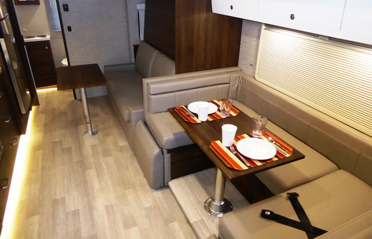 Mood lighting, under the seats & sofa storage, dinette table, additional table, easy to care for floors & cabinets