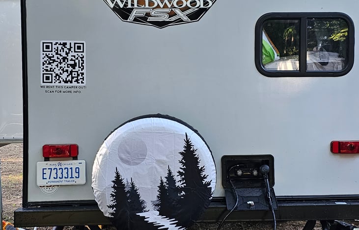 Back of the rig - showing the shower cubby. Water pump & heater need to be on for good pressure/warm water.