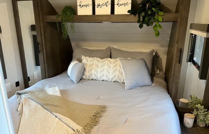 Private master bedroom with upgraded green tea-infused memory foam mattress for a restful night's sleep. Plenty of storage on either side & electrical outlets on each bedside. Bedding included.