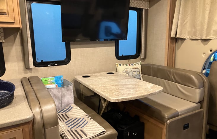 Kitchen eating area that can convert to a small children's bed.