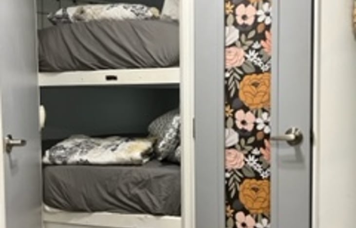 Bunk beds with new, thick mattresses