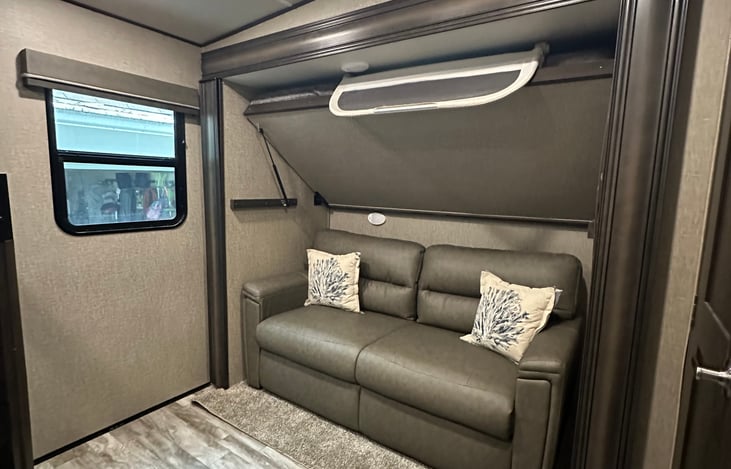 Sleeper sofa converts to full bed. Bunk folds up when not in use