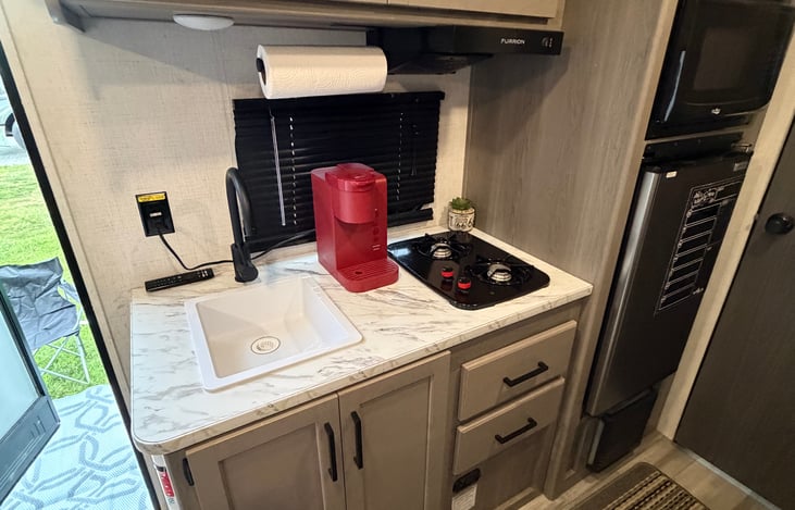 Kitchen with keurig because coffee is essential no
Matter the trip.