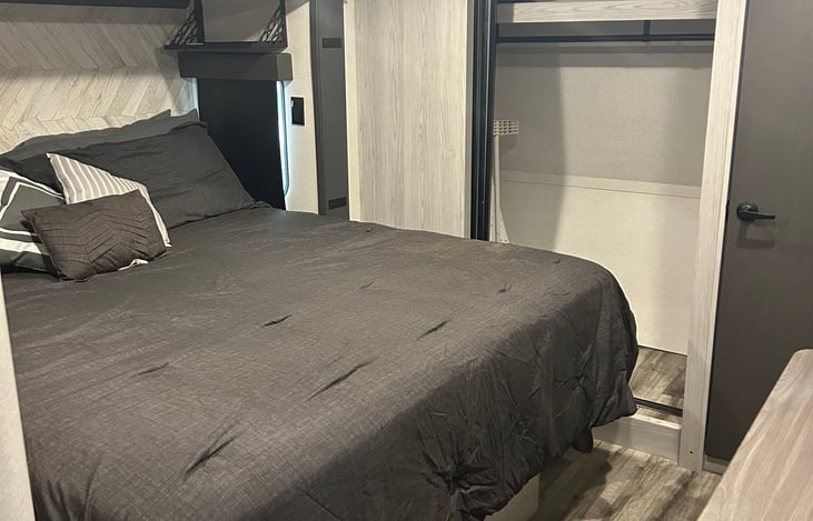 Primary Bedroom w/ King Size Bed, dresser and Large Closet