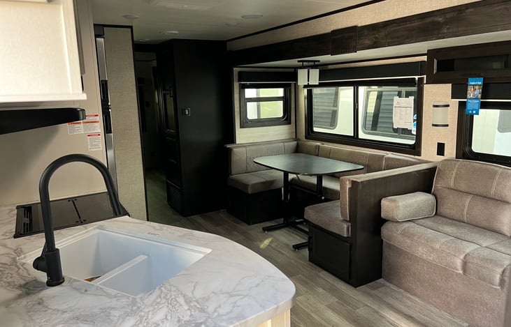 Living Area. Couch and Dinette fold down to extra sleeping spaces.