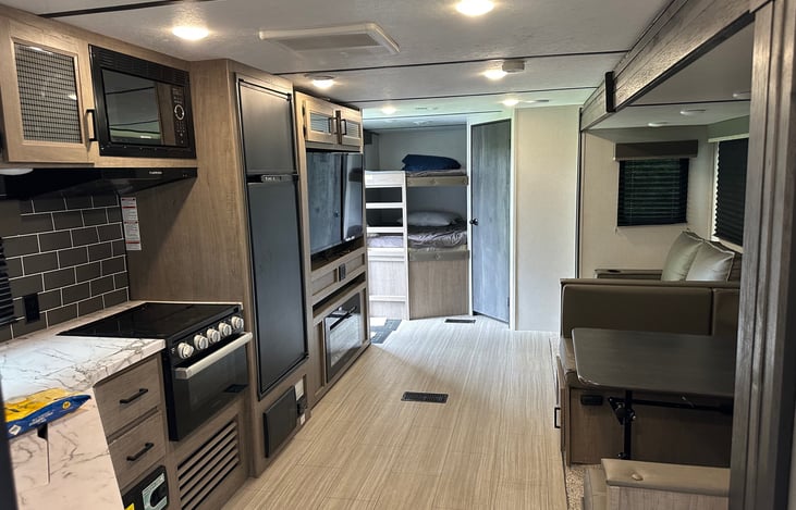 Couch - turns into bed
Pantry behind TV