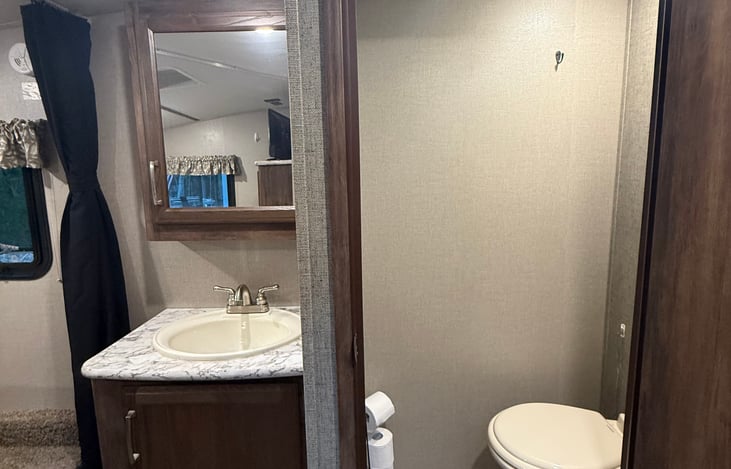 Private bath with wash station outside of bath