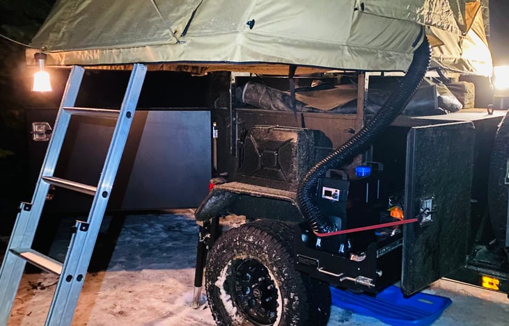 Picture of diesel heater area with flex hose that into the tent.