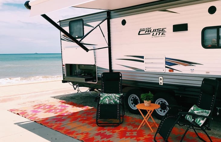 Complete with a patio set up, Zero Gravity Chairs, Camping Chairs, and A Side Table!