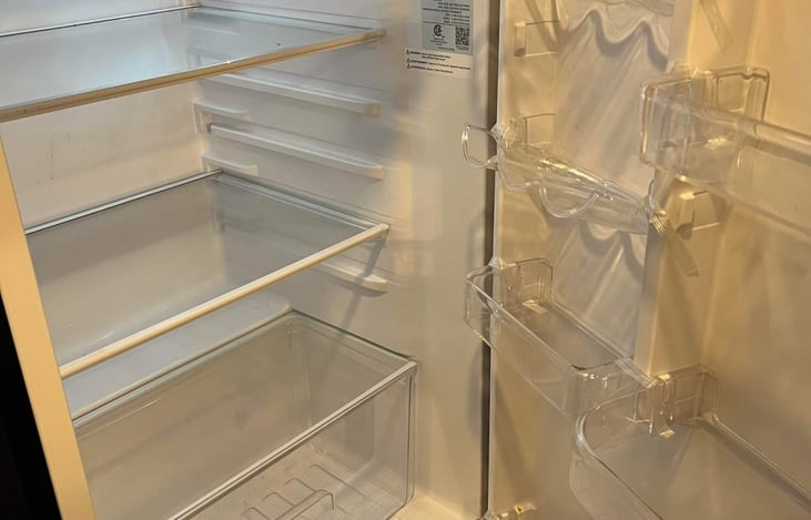 Large refrigerator with travel door lock