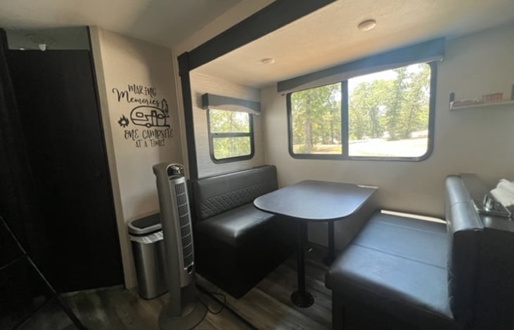 Table that breaks down into another sleeping area. Both benches have storage underneath.