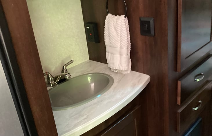 Separate hand washing sink