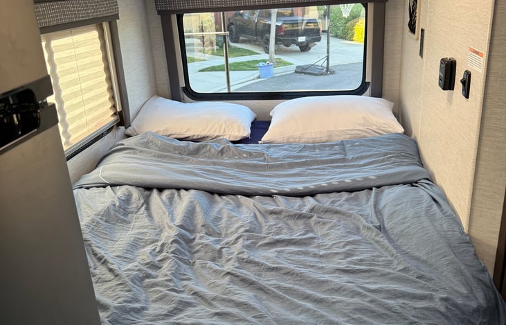 Down comforter, pillows and linens are available.