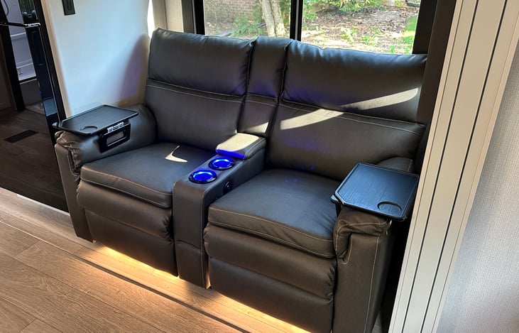 Reclining theatre seats, recessed lighting