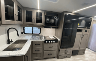 His and Her BathRooms--2024 Grand Design 321BH
