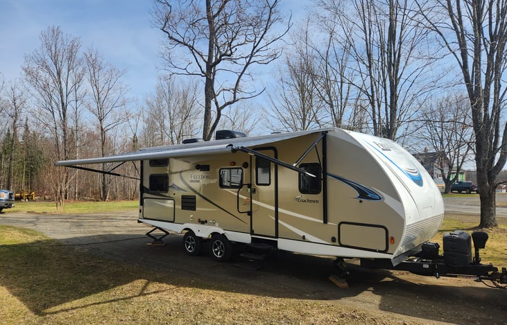 Awning fully extended which covers the outdoor cooking area