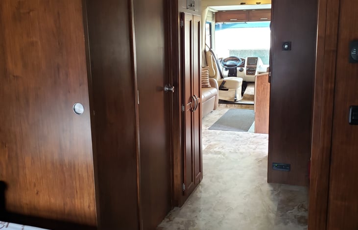 Hall from primary bedroom.  Bathroom on left, twin bunks on the right.