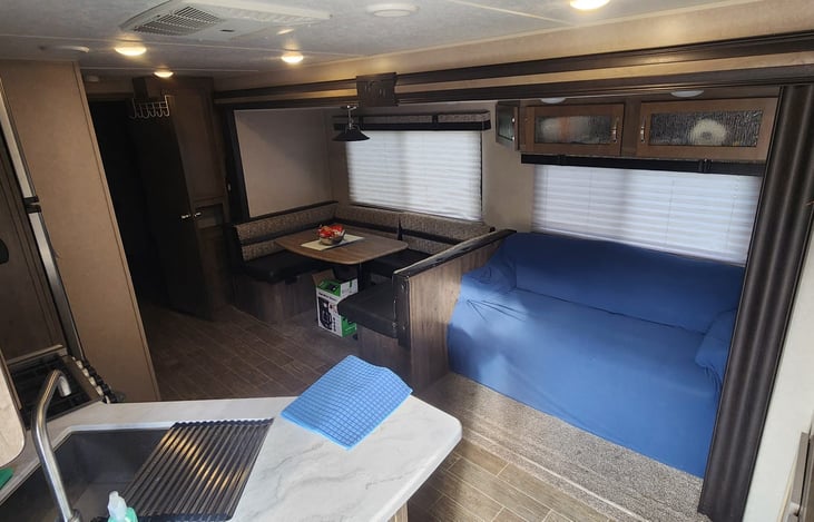 U shape Dinette.  Can be converted for more sleep space.