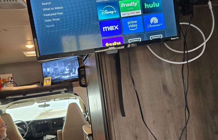 2 TV's  Front TV has DVD player  and attached  ROKU. Back TV is a Roku TV.