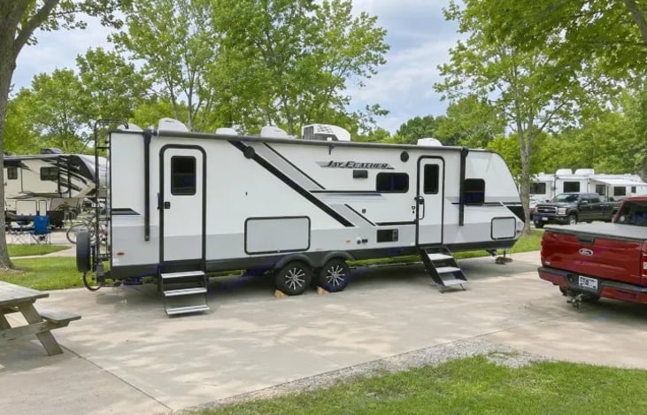 "Feathered Nest" comes equipped with a massive 21-Foot Power Patio Awning that extends at the touch of a button to create a huge, shaded outdoor living room complete with built-in LED lighting.