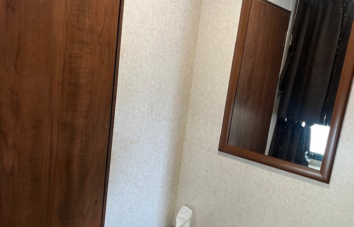 Separate bathroom allows for two people to get ready at once.