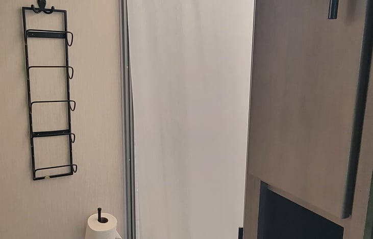 There is a skylight in the shower to create light and space.
