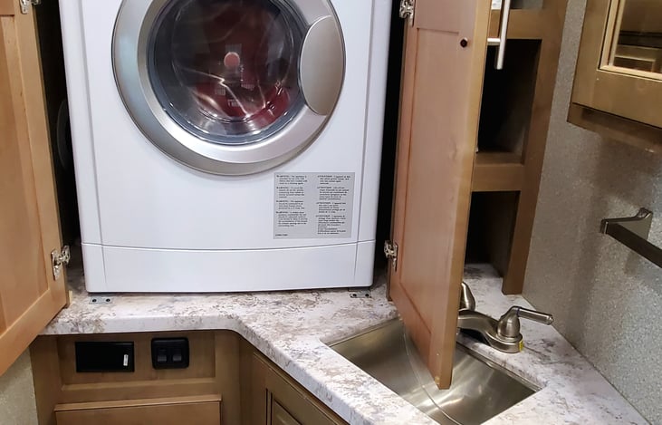 Master Bathroom with washer/dryer installed.