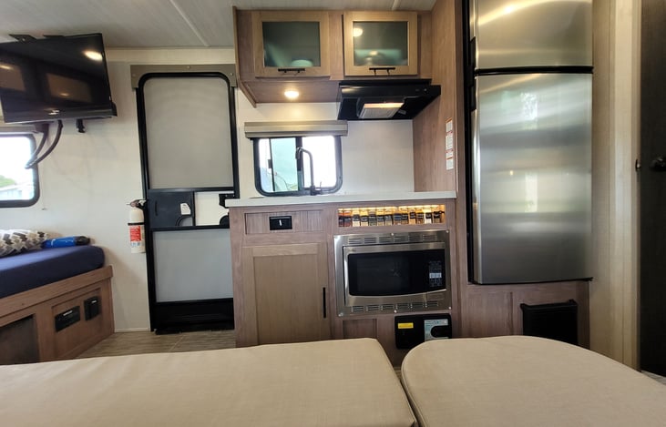 Kitchen with spice rack.