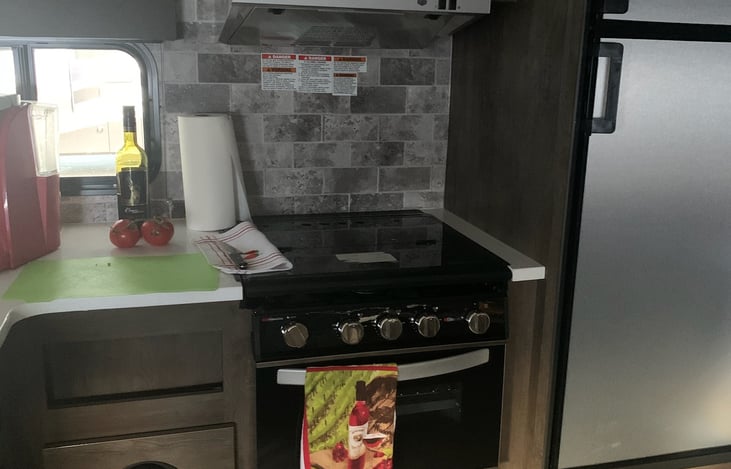 Stove and partial countertop view