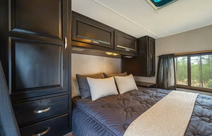 Cozy and private, this Thor Majestic 28A bedroom makes every night feel like home — pet friendly and sleeps 6 comfortably