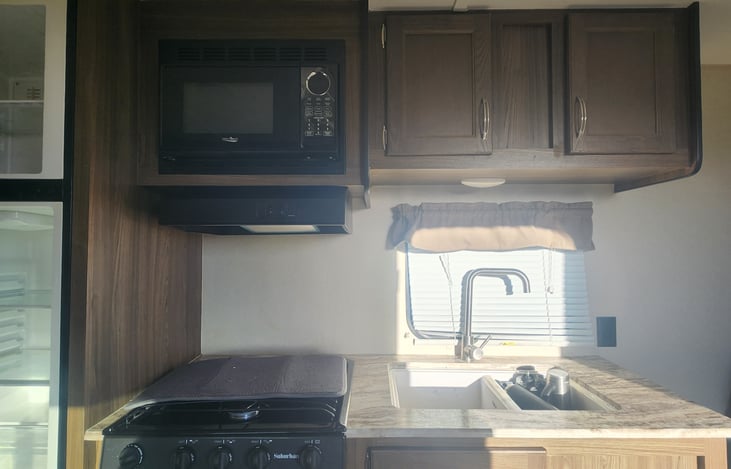 Kitchen. ( Microwave, stove, oven, Double sink)